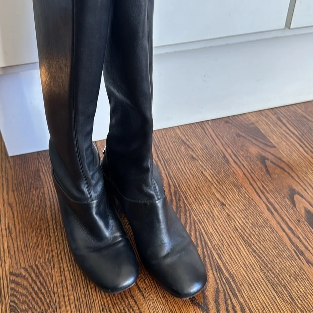 Tory Burch Black Sidney Leather 70mm Knee Boot. Stacked heel. Metal heel logo. 7